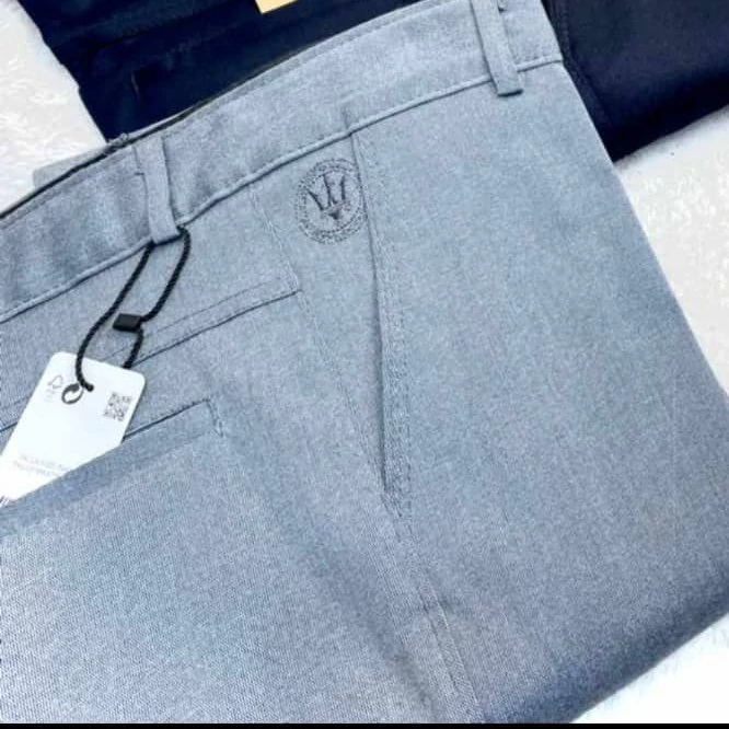 svZOH5X3Bsrubb3Ib3OwDlJDRpen1TKdmw3F4w5LvWthqRLapo.jpg_800X800X70 شلوار مردانه اسپرت کش جنس فاستونی نخی فاق متوسط - Image 1